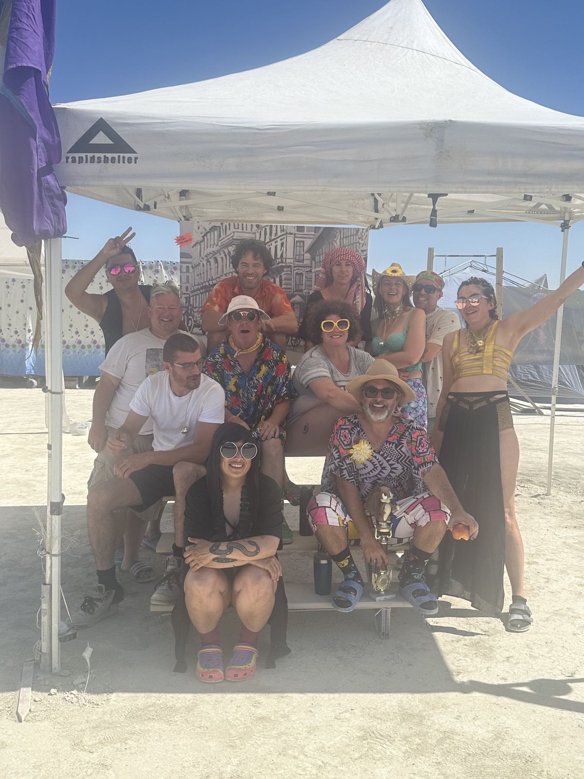 Group shot under the rapid shelter